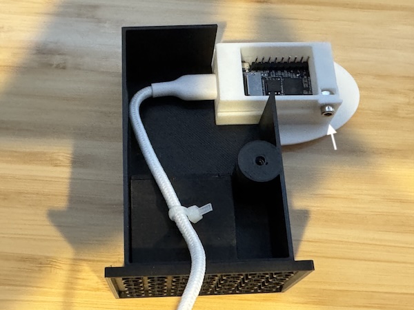Removing the device holder screw